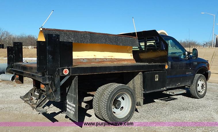 image for item I5140 2000 Ford F450 Super Duty flatbed dump truck