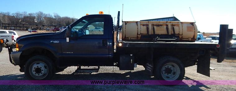 image for item I5140 2000 Ford F450 Super Duty flatbed dump truck