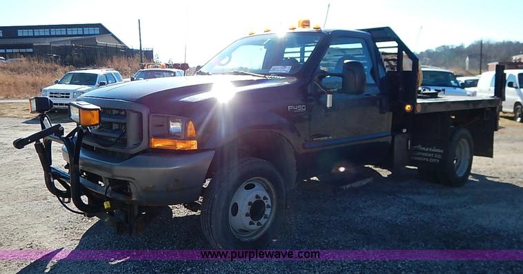 image for item I5140 2000 Ford F450 Super Duty flatbed dump truck