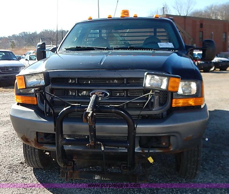 image for item I5140 2000 Ford F450 Super Duty flatbed dump truck