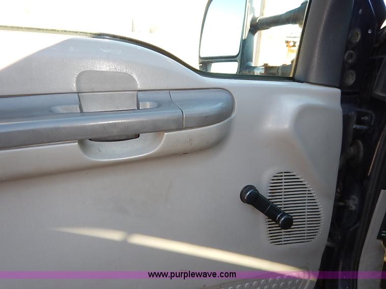 image for item I5140 2000 Ford F450 Super Duty flatbed dump truck