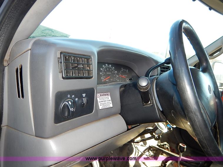 image for item I5140 2000 Ford F450 Super Duty flatbed dump truck