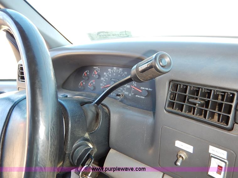 image for item I5140 2000 Ford F450 Super Duty flatbed dump truck