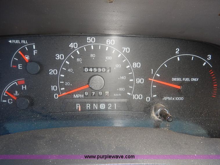 image for item I5140 2000 Ford F450 Super Duty flatbed dump truck