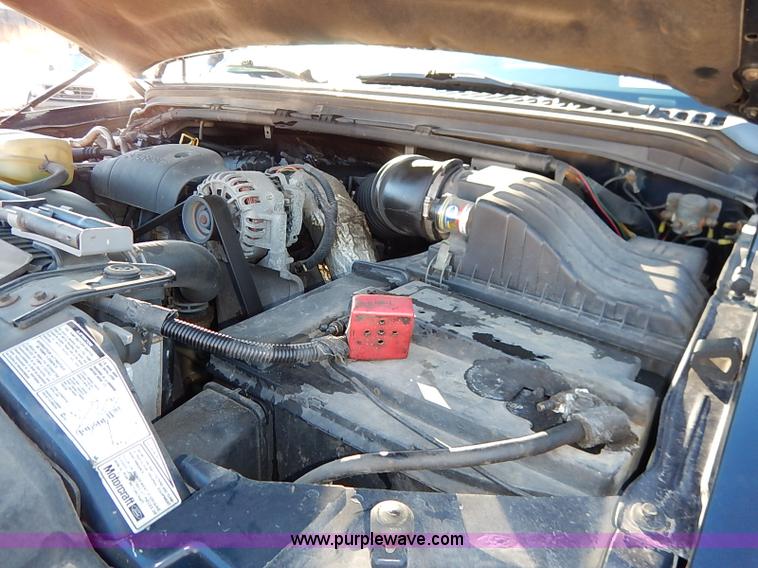 image for item I5140 2000 Ford F450 Super Duty flatbed dump truck