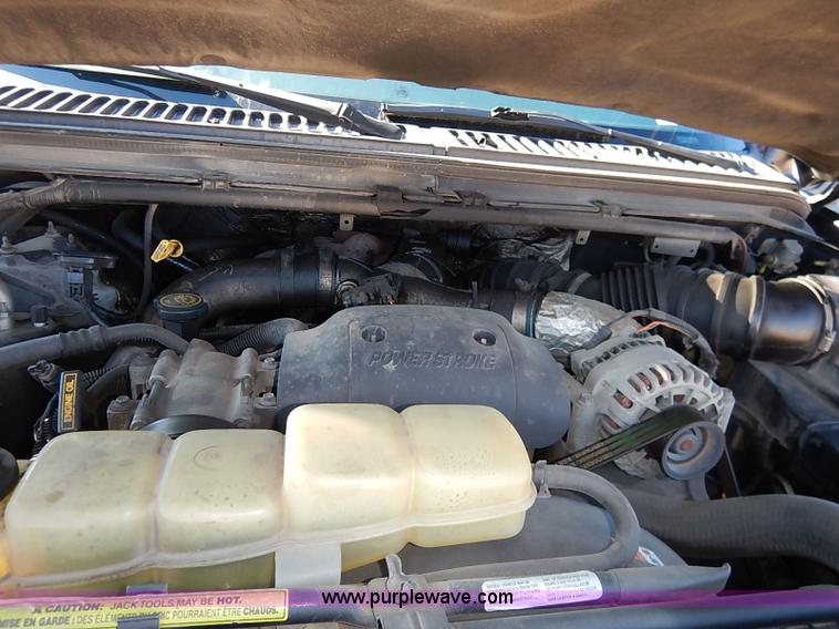 image for item I5140 2000 Ford F450 Super Duty flatbed dump truck