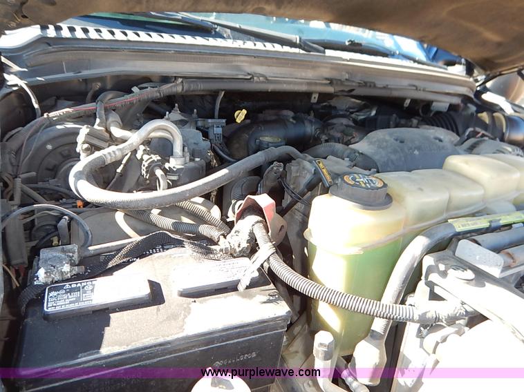 image for item I5140 2000 Ford F450 Super Duty flatbed dump truck