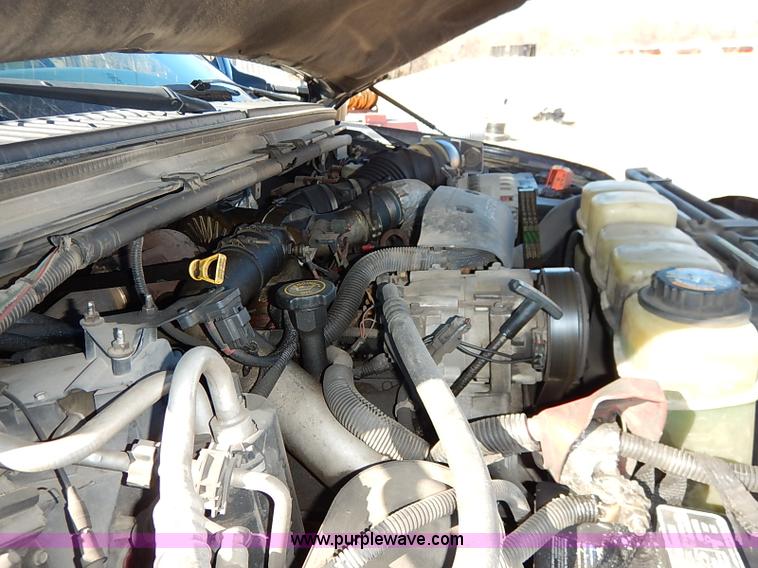 image for item I5140 2000 Ford F450 Super Duty flatbed dump truck