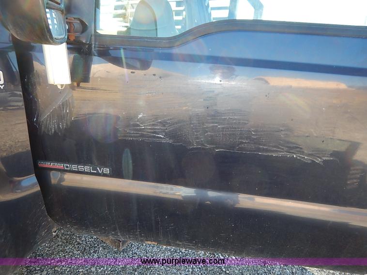 image for item I5140 2000 Ford F450 Super Duty flatbed dump truck