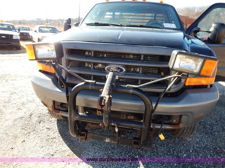image for item I5140 2000 Ford F450 Super Duty flatbed dump truck