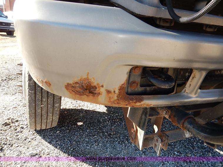 image for item I5140 2000 Ford F450 Super Duty flatbed dump truck