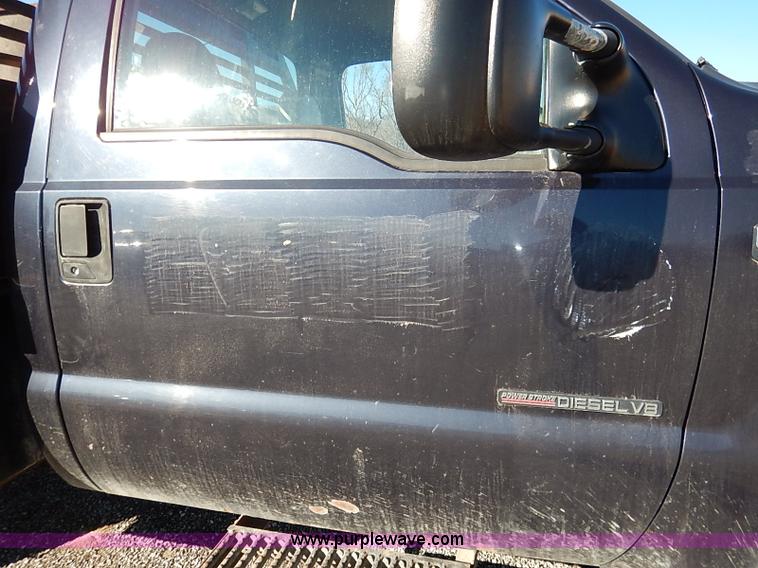 image for item I5140 2000 Ford F450 Super Duty flatbed dump truck