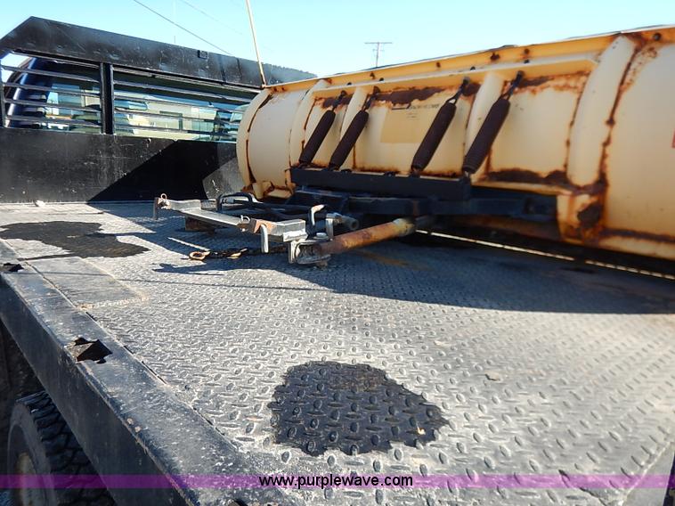 image for item I5140 2000 Ford F450 Super Duty flatbed dump truck