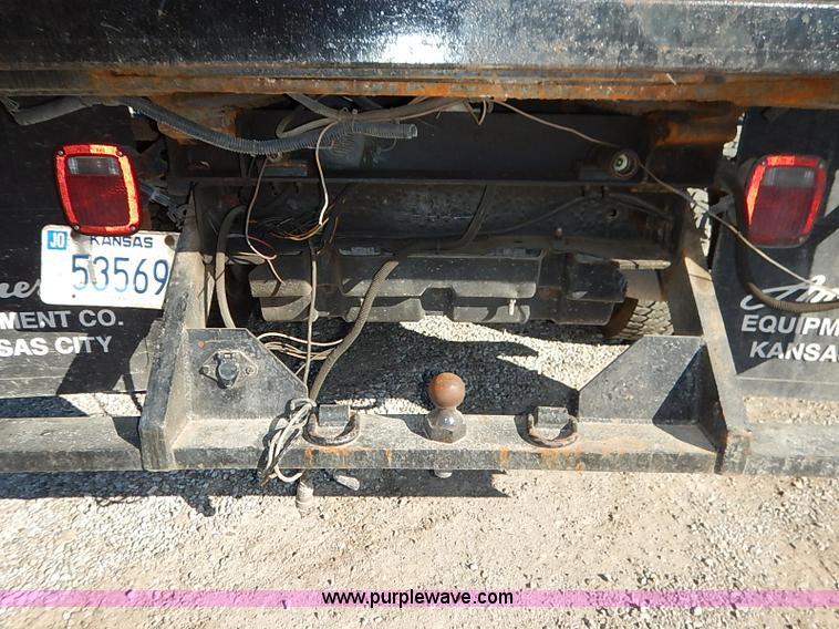 image for item I5140 2000 Ford F450 Super Duty flatbed dump truck