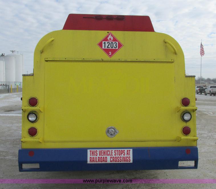 image for item I8812 1999 Freightliner FL70 fuel truck