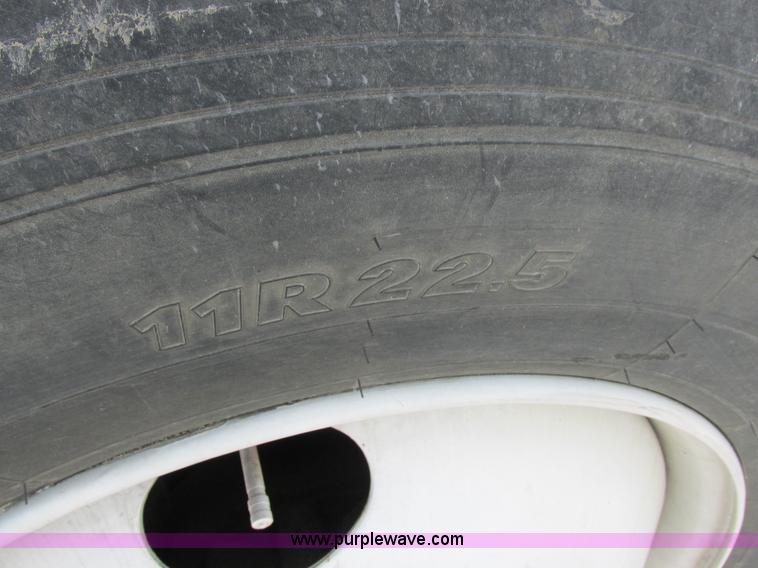 image for item I8812 1999 Freightliner FL70 fuel truck