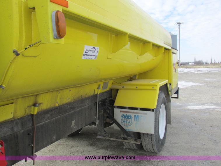 image for item I8812 1999 Freightliner FL70 fuel truck