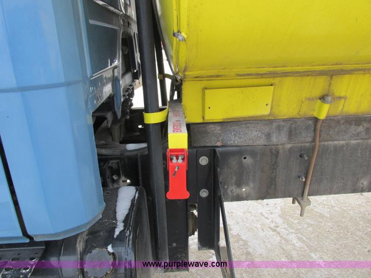 image for item I8812 1999 Freightliner FL70 fuel truck