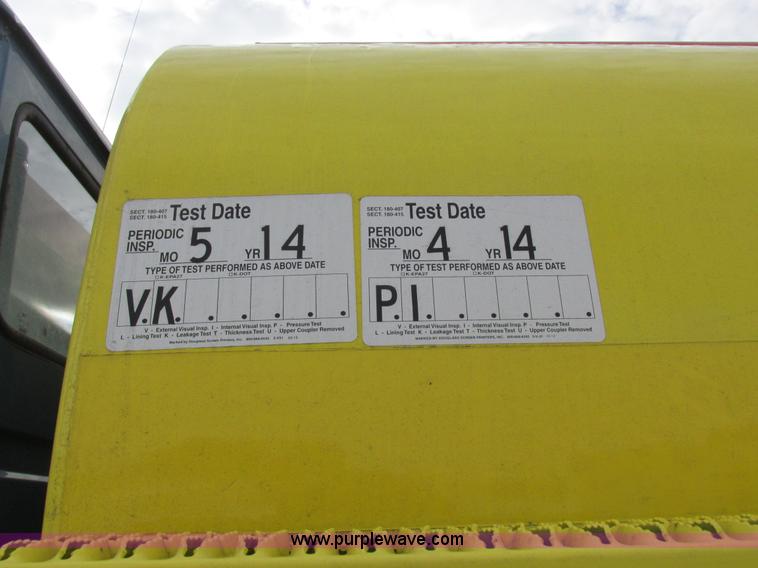 image for item I8812 1999 Freightliner FL70 fuel truck