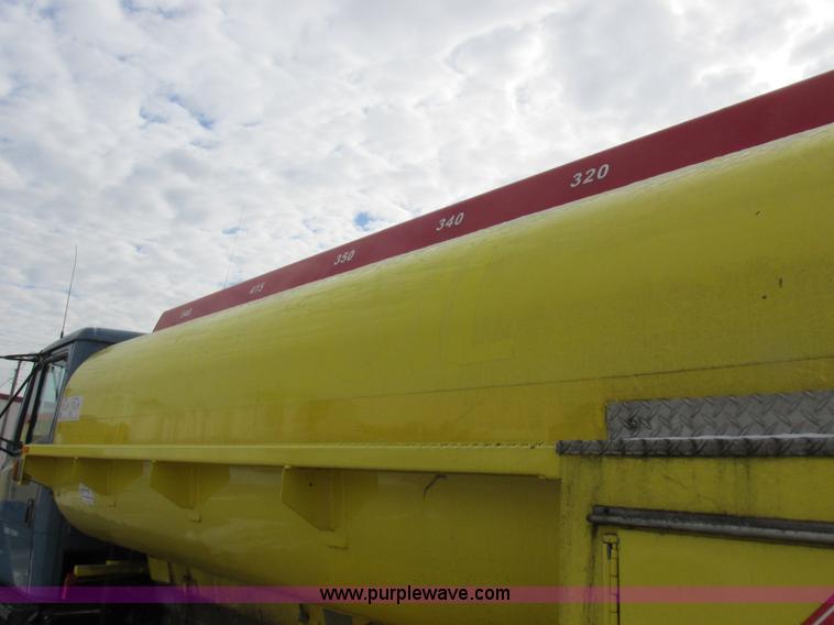 image for item I8812 1999 Freightliner FL70 fuel truck