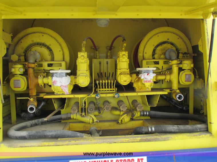 image for item I8812 1999 Freightliner FL70 fuel truck