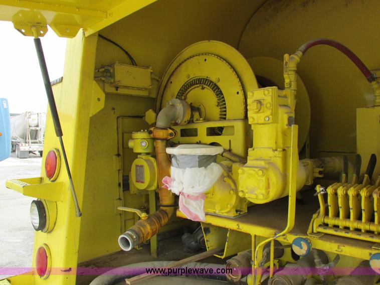 image for item I8812 1999 Freightliner FL70 fuel truck