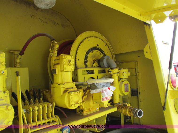 image for item I8812 1999 Freightliner FL70 fuel truck