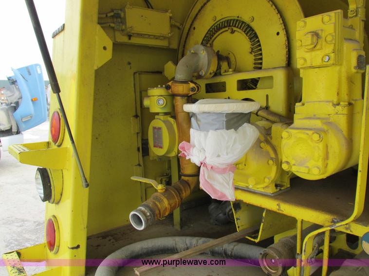 image for item I8812 1999 Freightliner FL70 fuel truck