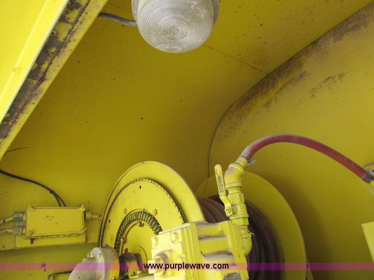 image for item I8812 1999 Freightliner FL70 fuel truck