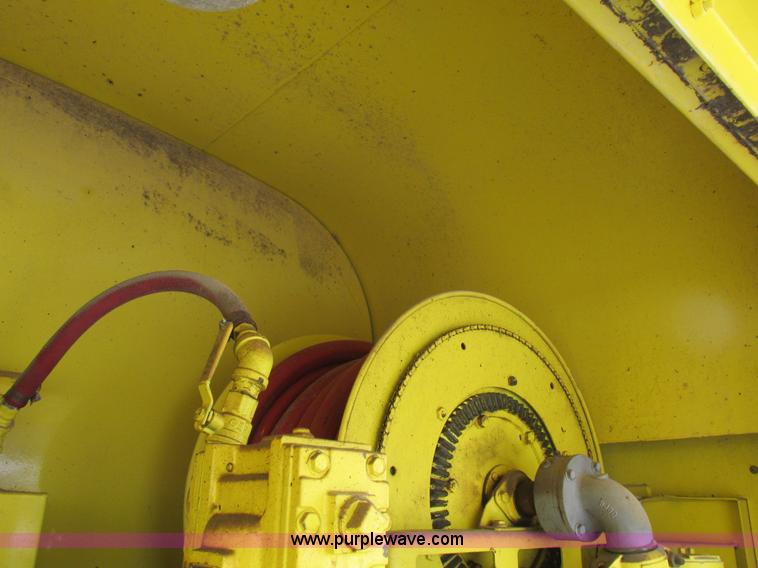 image for item I8812 1999 Freightliner FL70 fuel truck