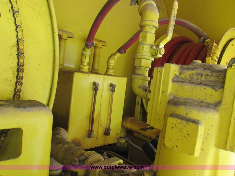 image for item I8812 1999 Freightliner FL70 fuel truck