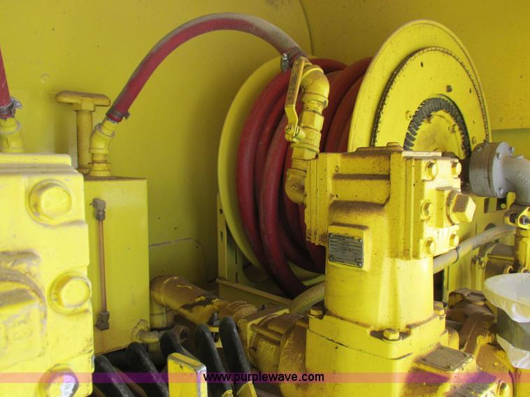 image for item I8812 1999 Freightliner FL70 fuel truck