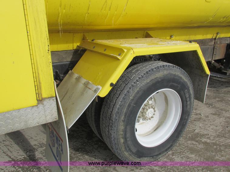 image for item I8812 1999 Freightliner FL70 fuel truck