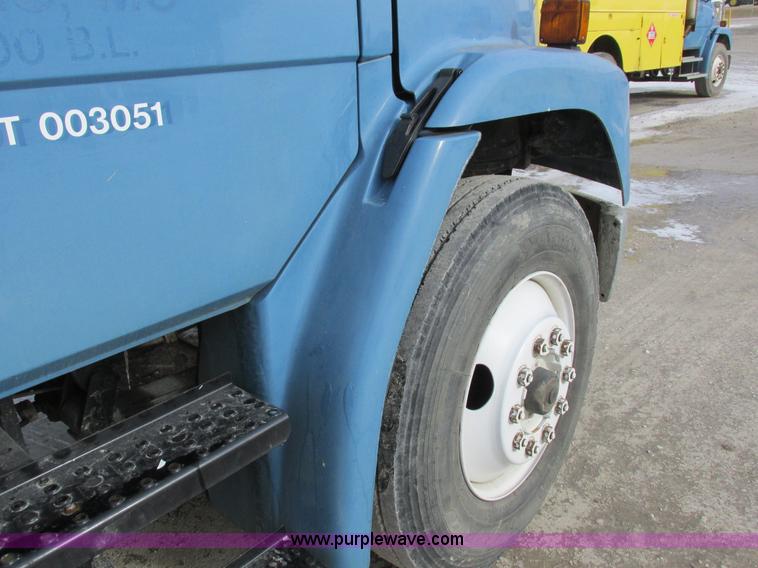 image for item I8812 1999 Freightliner FL70 fuel truck