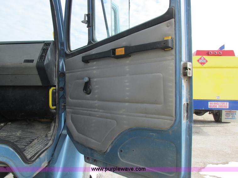 image for item I8812 1999 Freightliner FL70 fuel truck