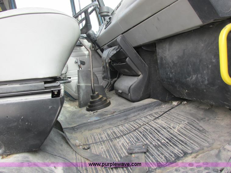 image for item I8812 1999 Freightliner FL70 fuel truck