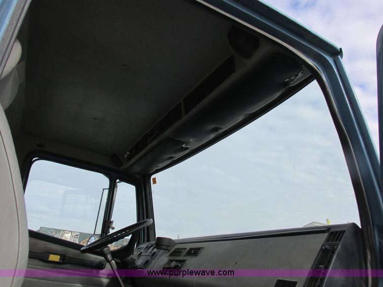 image for item I8812 1999 Freightliner FL70 fuel truck