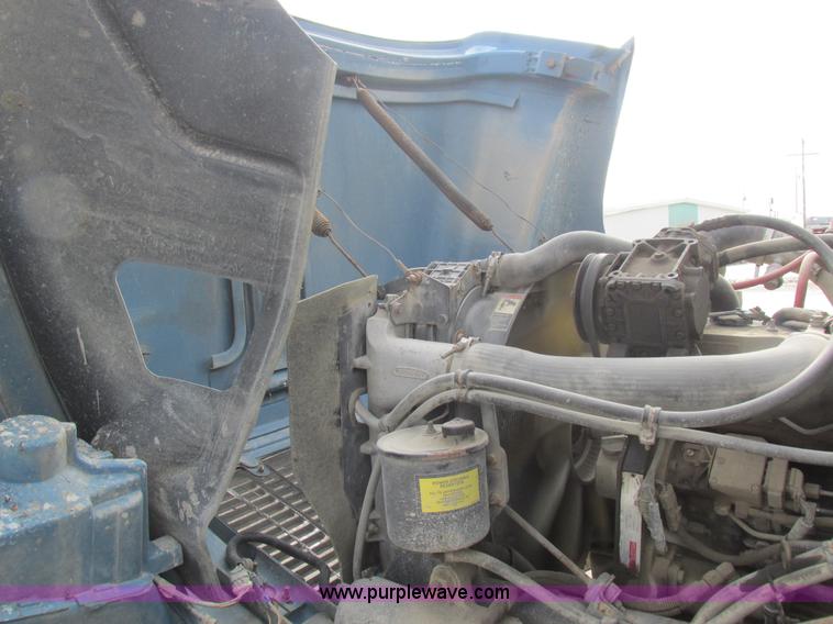 image for item I8812 1999 Freightliner FL70 fuel truck