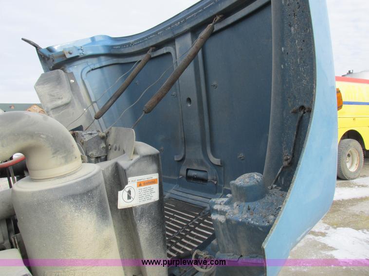 image for item I8812 1999 Freightliner FL70 fuel truck