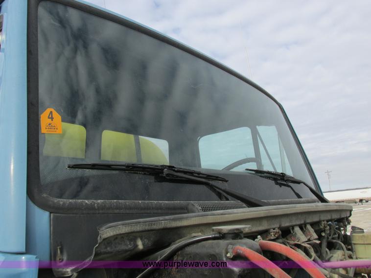 image for item I8812 1999 Freightliner FL70 fuel truck