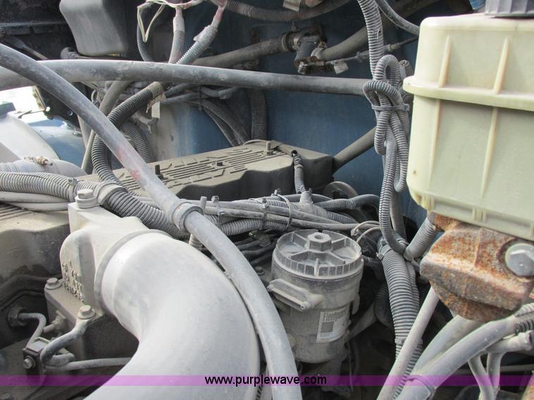 image for item I8812 1999 Freightliner FL70 fuel truck