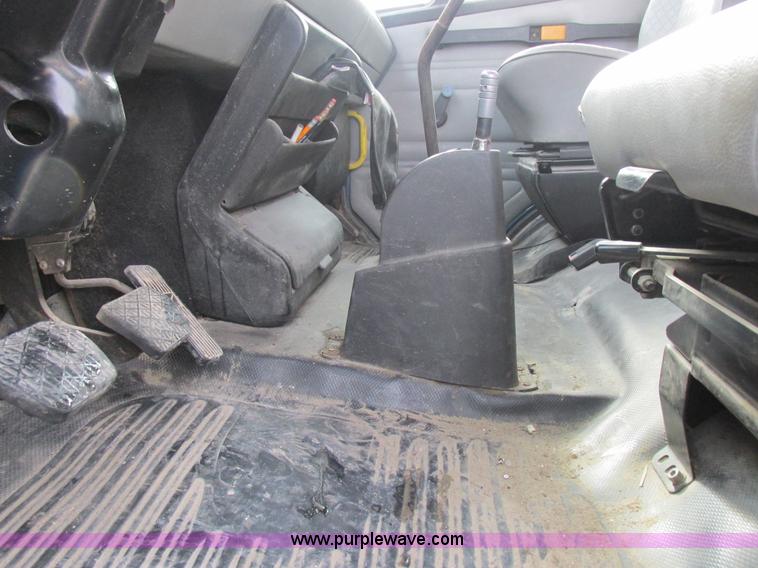 image for item I8812 1999 Freightliner FL70 fuel truck