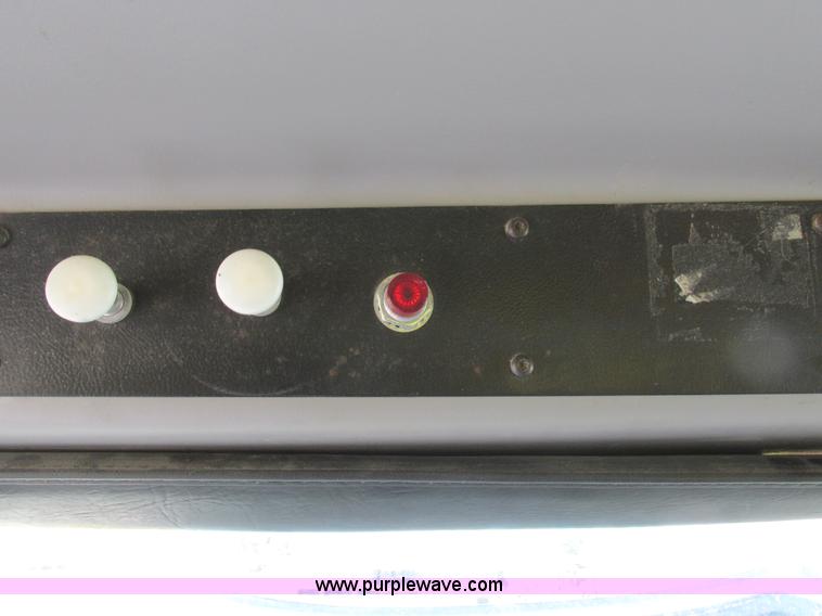 image for item I8812 1999 Freightliner FL70 fuel truck