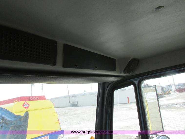 image for item I8812 1999 Freightliner FL70 fuel truck