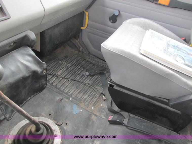 image for item I8812 1999 Freightliner FL70 fuel truck