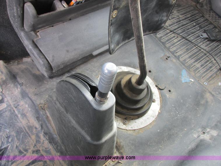 image for item I8812 1999 Freightliner FL70 fuel truck