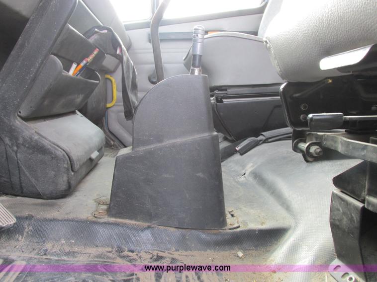 image for item I8812 1999 Freightliner FL70 fuel truck