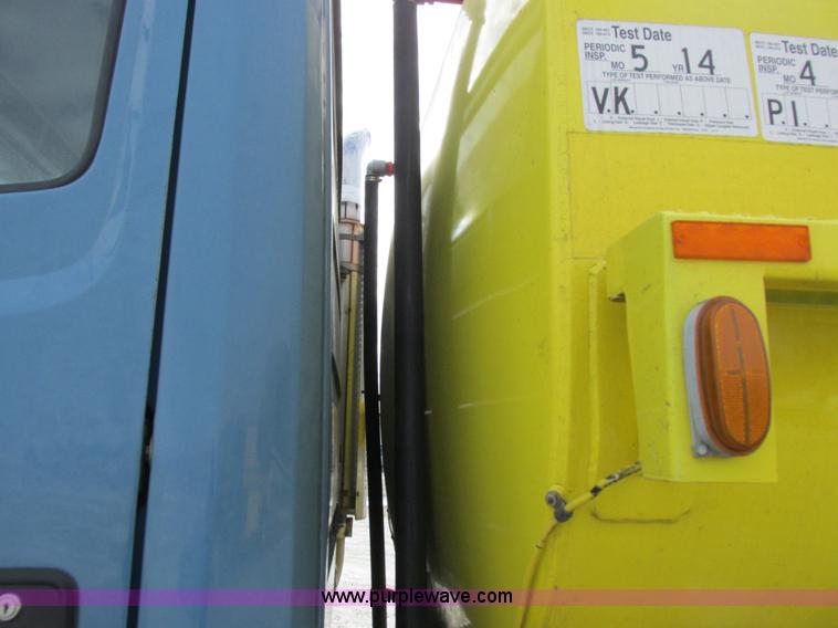 image for item I8812 1999 Freightliner FL70 fuel truck