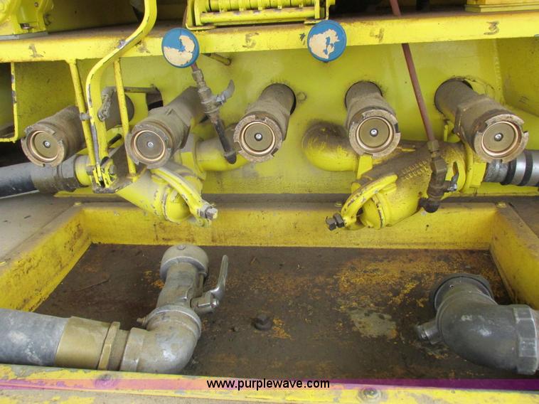 image for item I8812 1999 Freightliner FL70 fuel truck