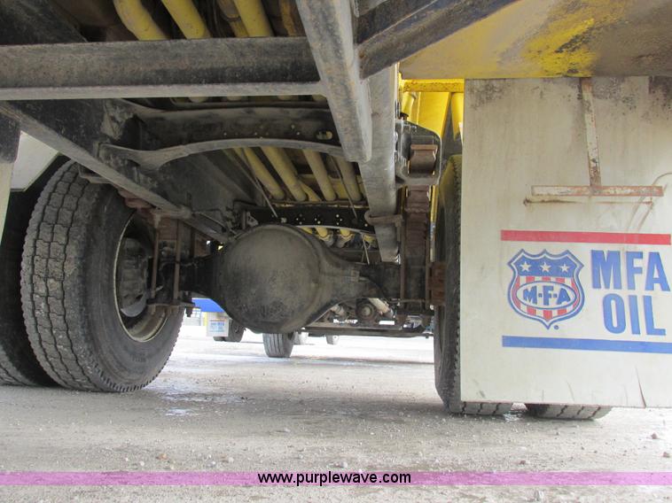 image for item I8812 1999 Freightliner FL70 fuel truck